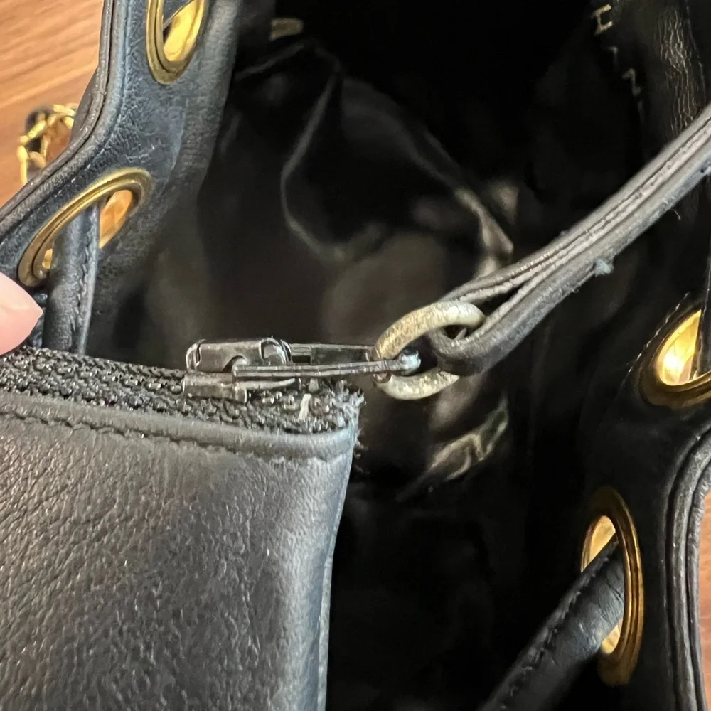 CHANEL Black Quilted Leather Drawstring Bucket Bag with Gold Hardware
