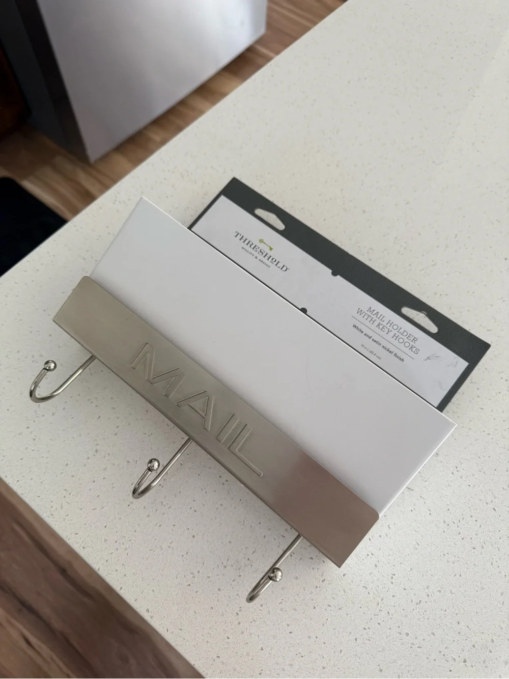 Threshold mail holder