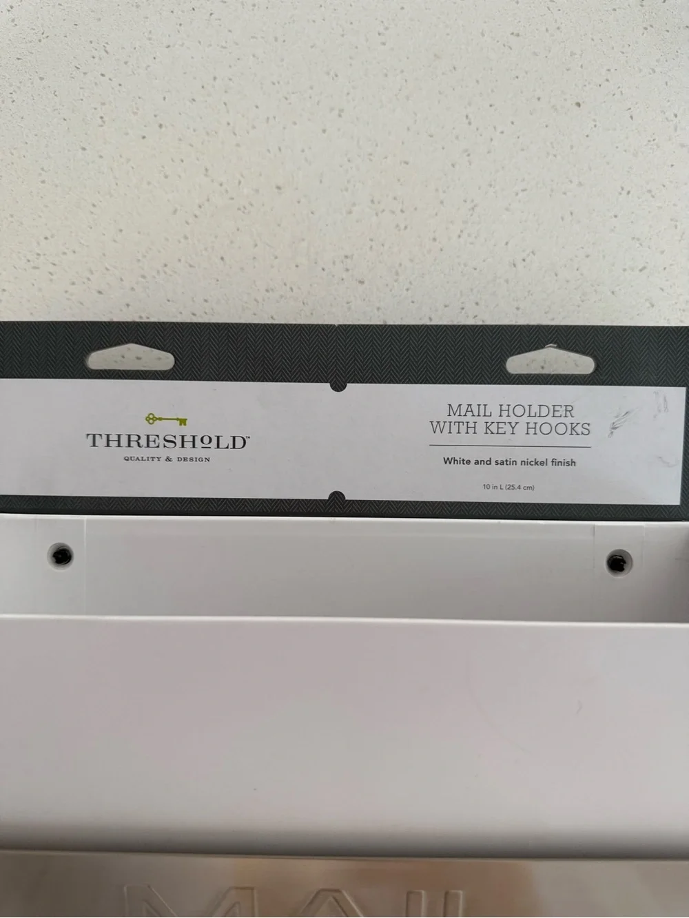 Threshold mail holder