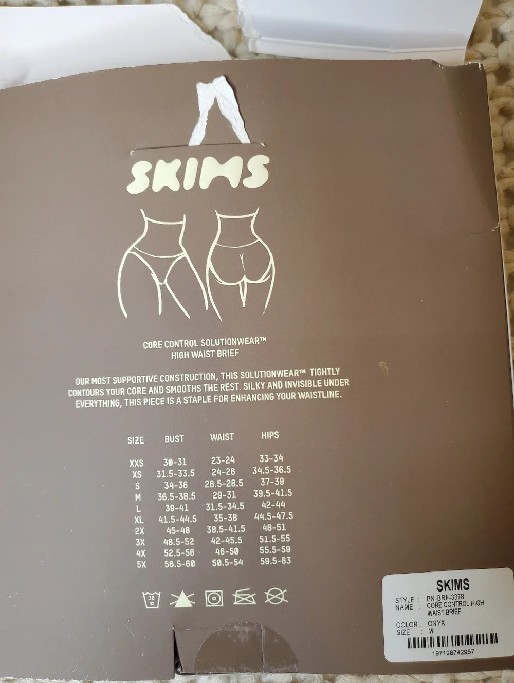 SKIMS open box