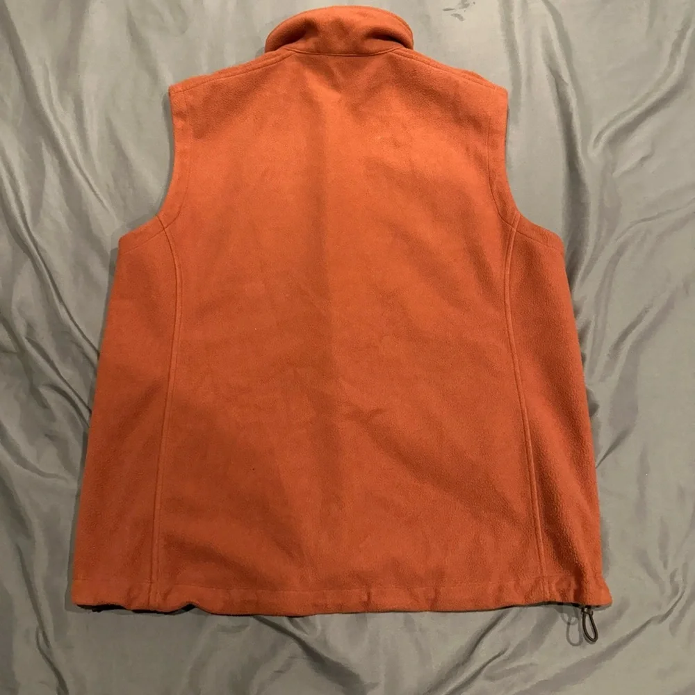 The North Face rust colored