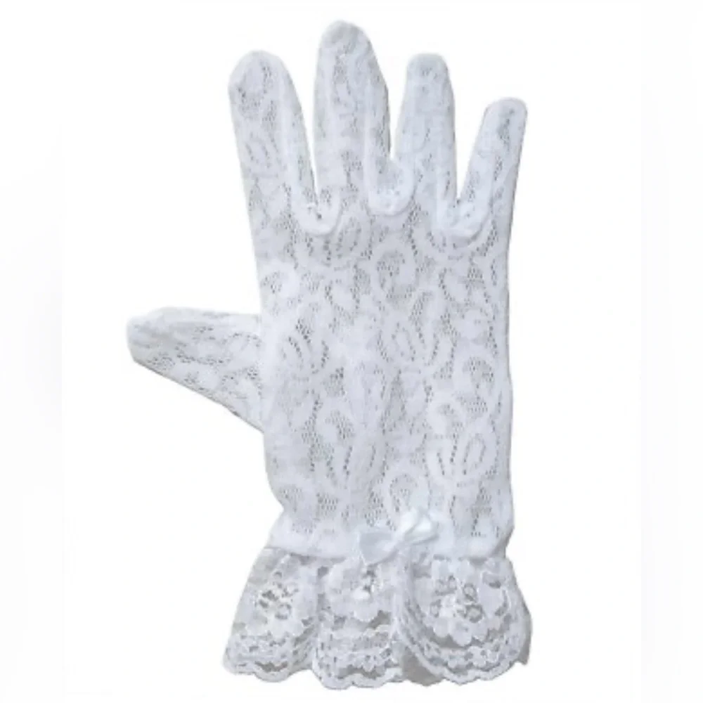 white lace gloves with a bow are labeled for children ages 4-7.