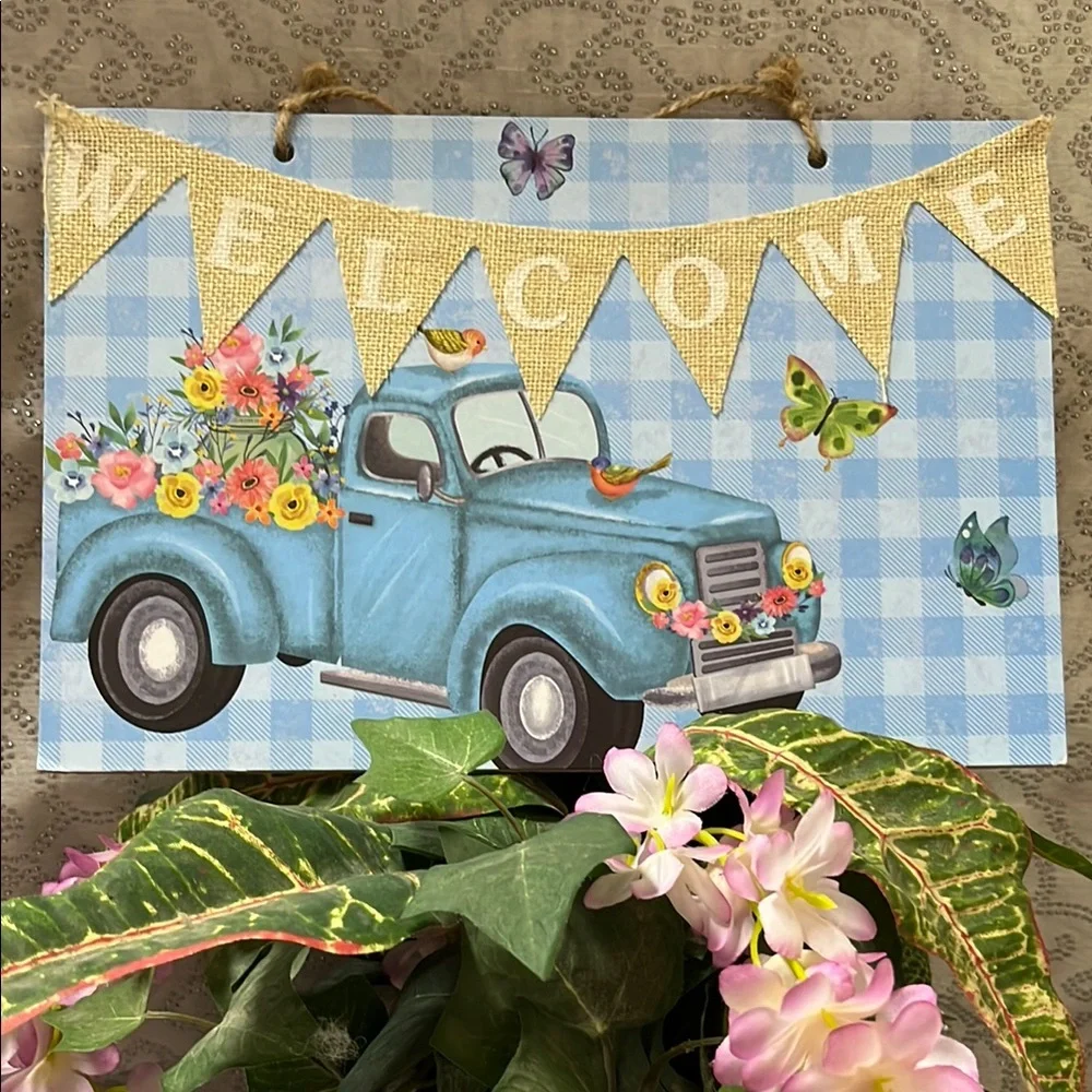 Blue Welcome Sign with Floral Truck Design