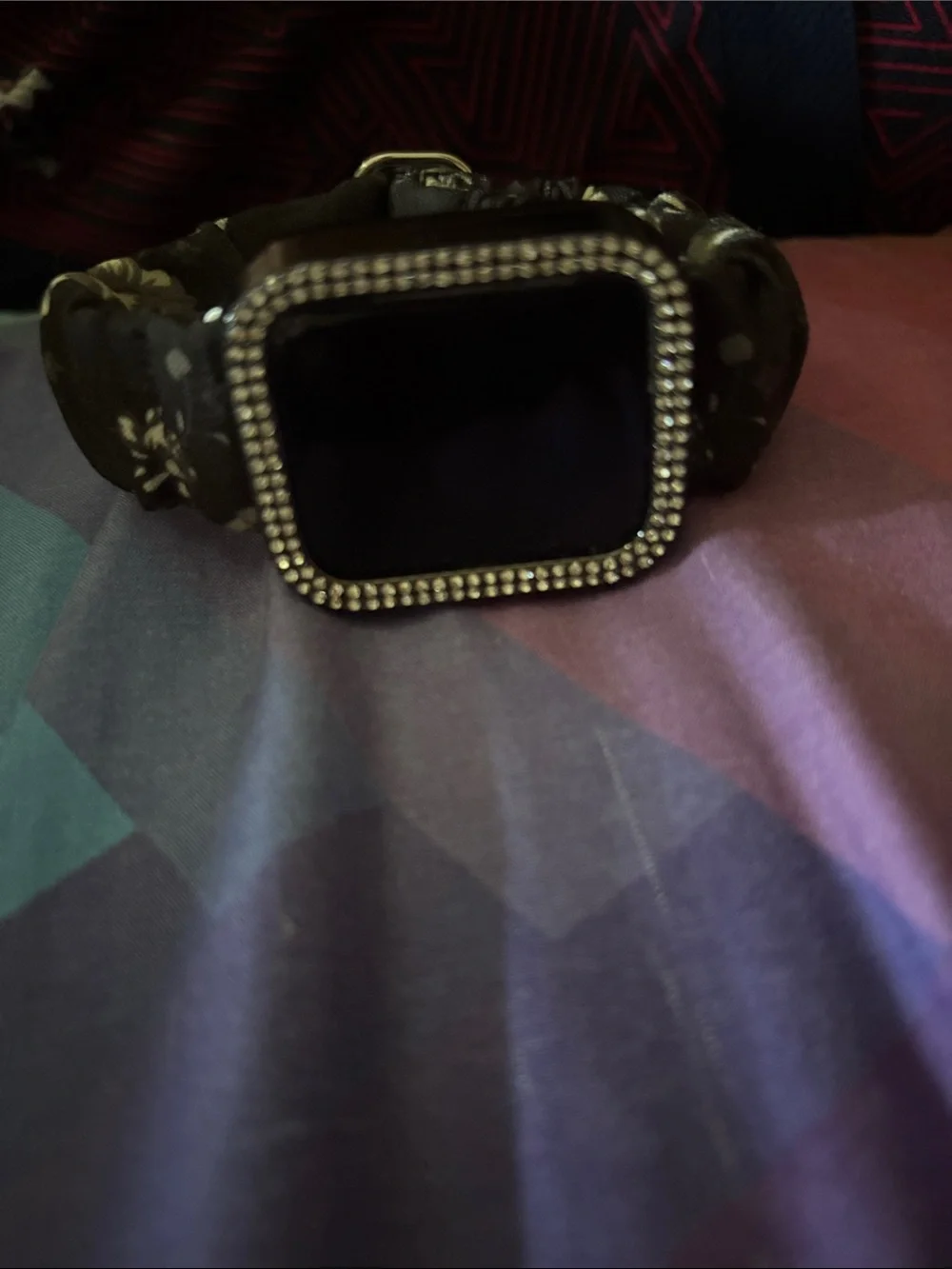 Apple Black Smartwatch with Rhinestone Bezel and Black Floral Band.
