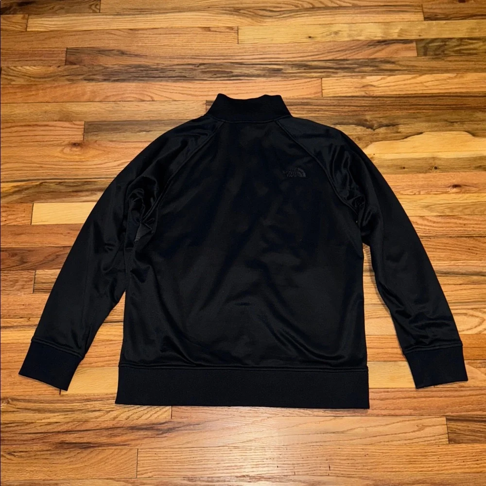 The North Face athletic outdoor hand