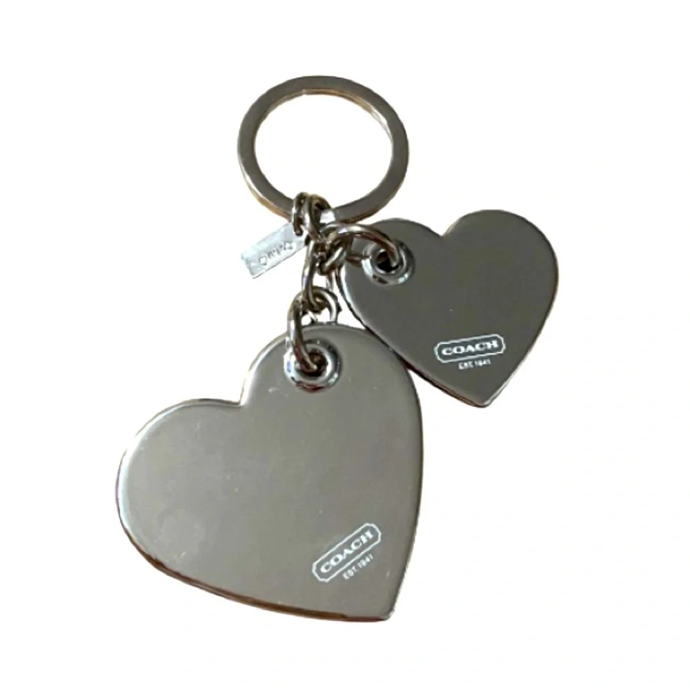 Coach charm embossed