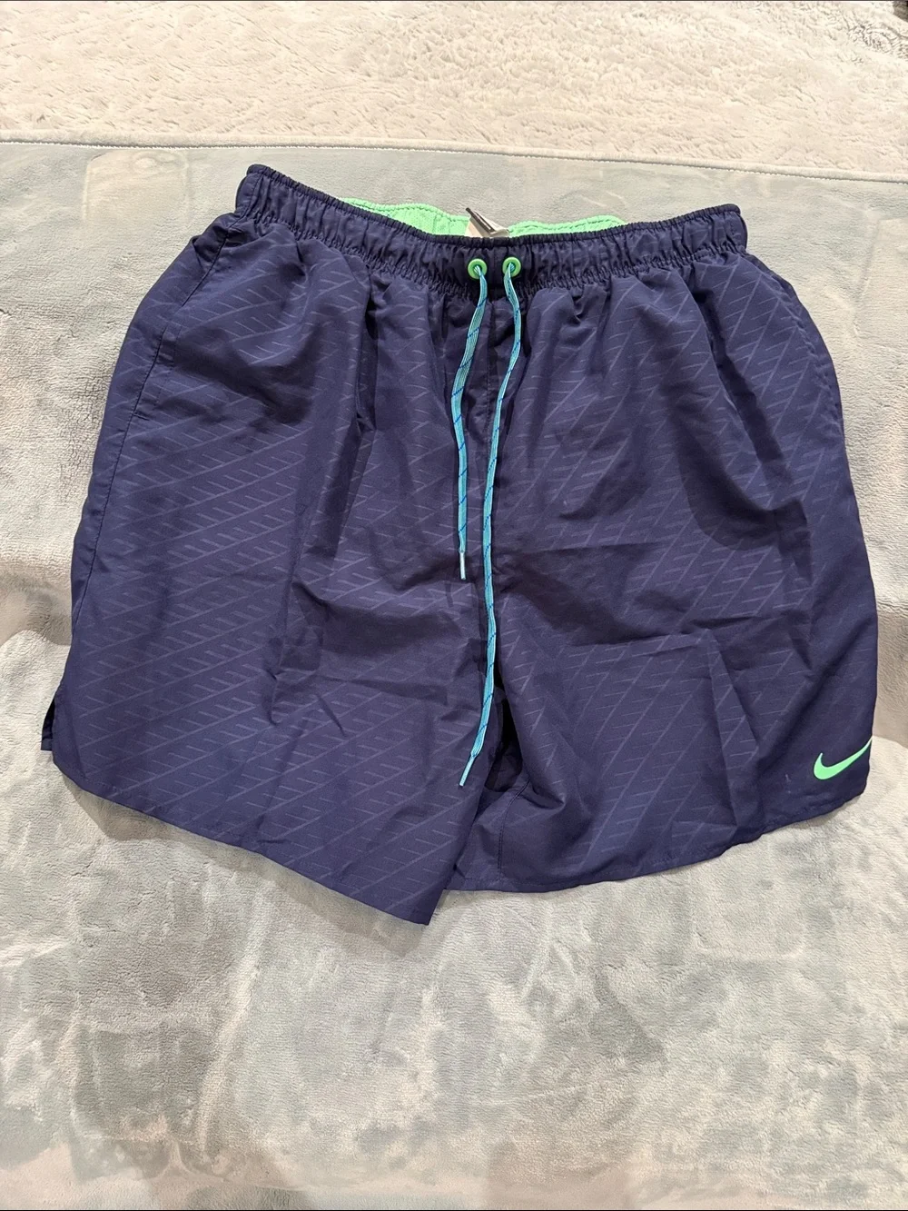 Nike Navy Athletic Shorts with Green Swoosh and Teal Drawcord