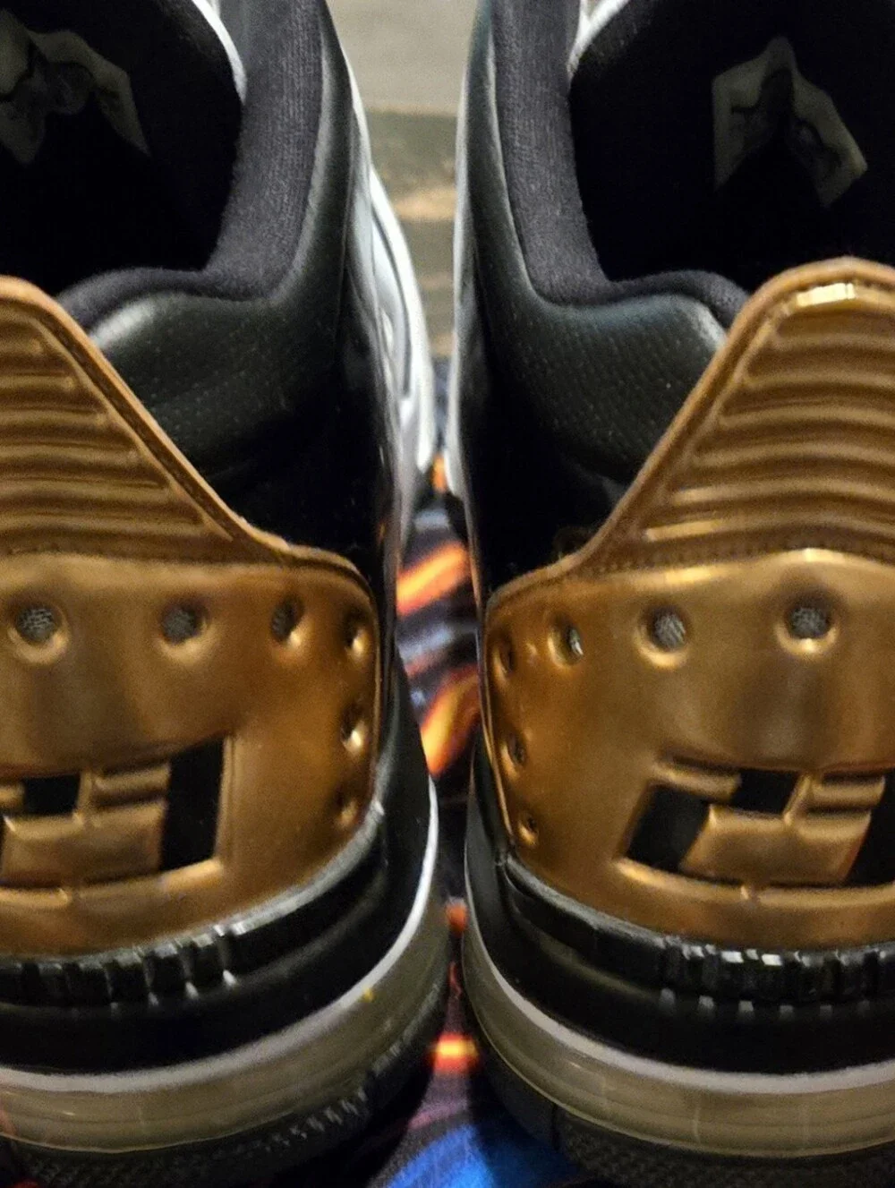 Jordan Men's Athletic Shoes in Black and Metallic Gold Heel