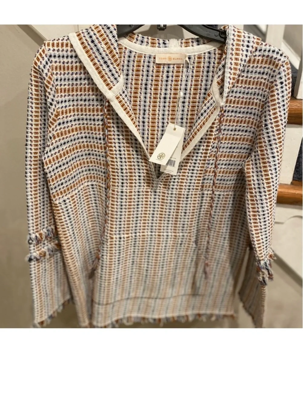 Tory Burch ties cuffs