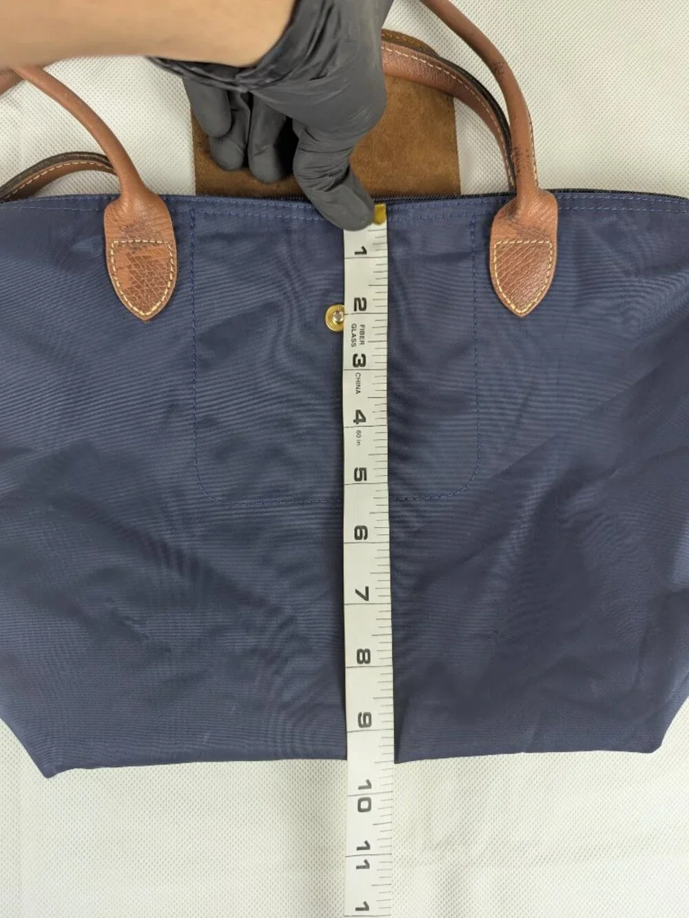 Longchamp material approximately minimum