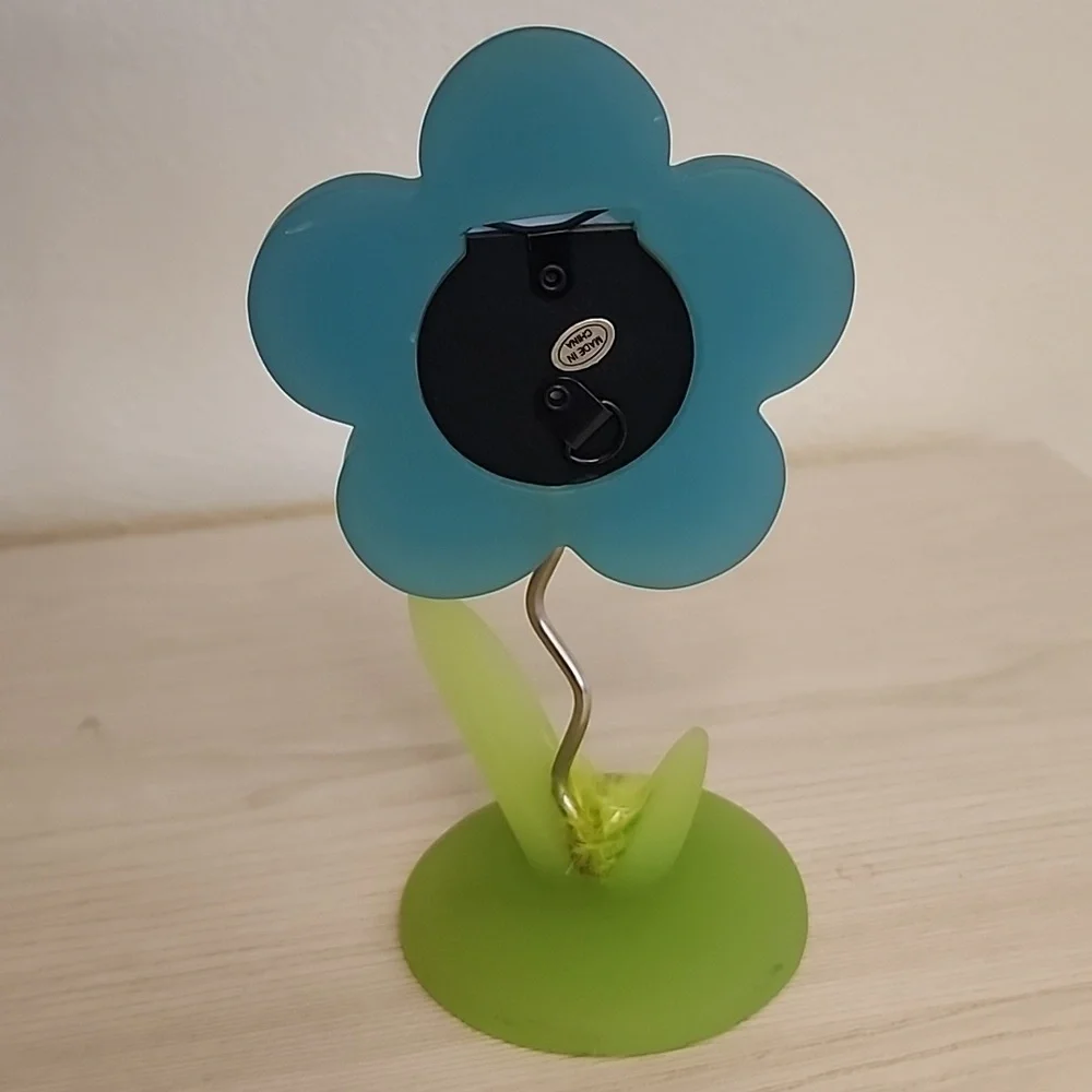 N/A teal flower