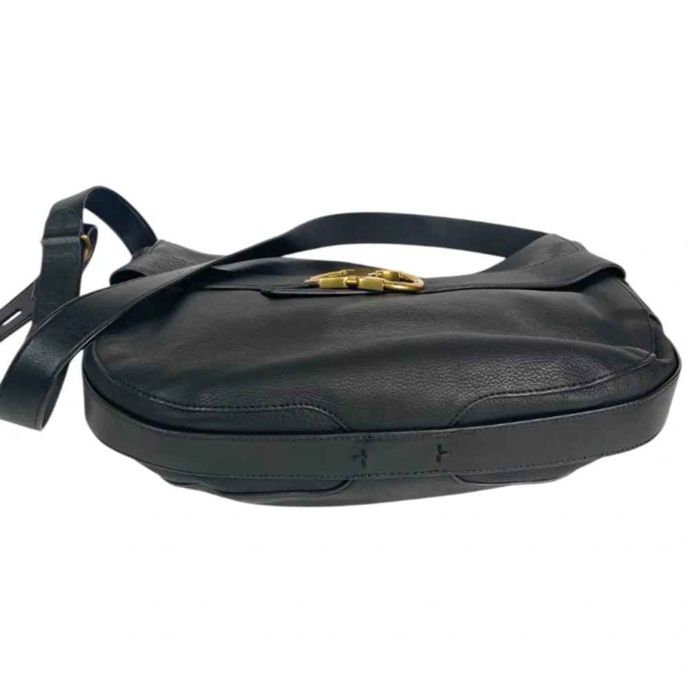 Tory Burch “buckle” marks
