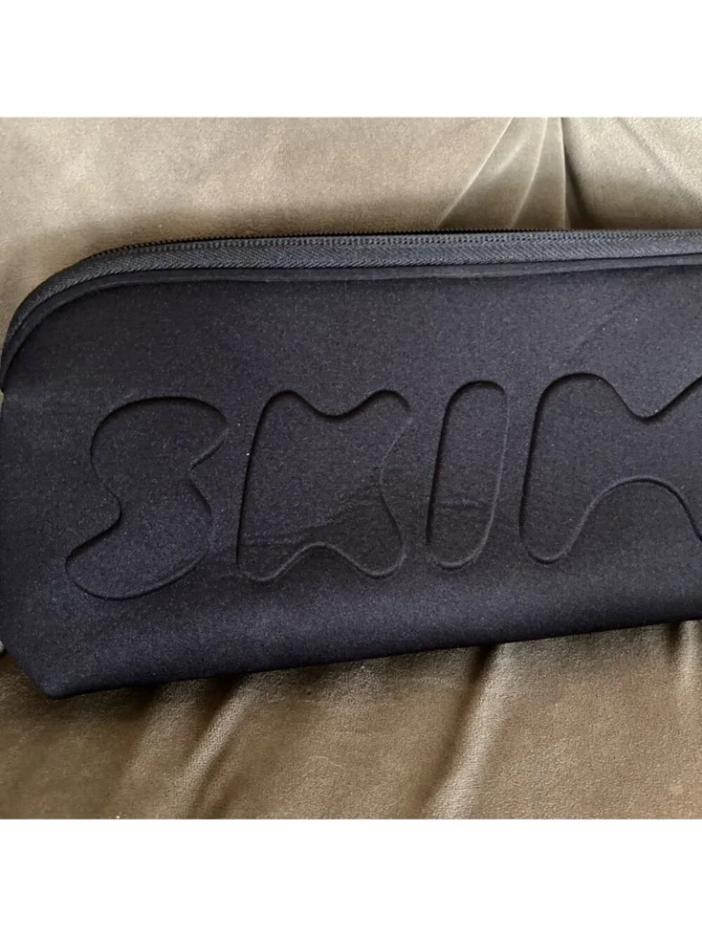 SKIMS see black