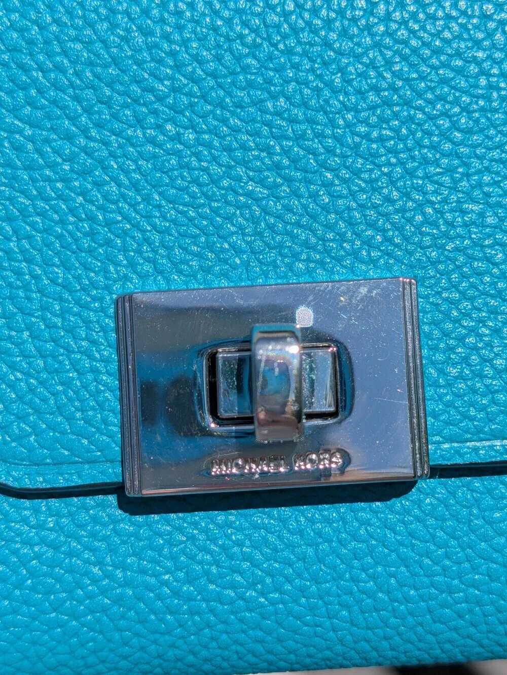 Michael Kors teal color