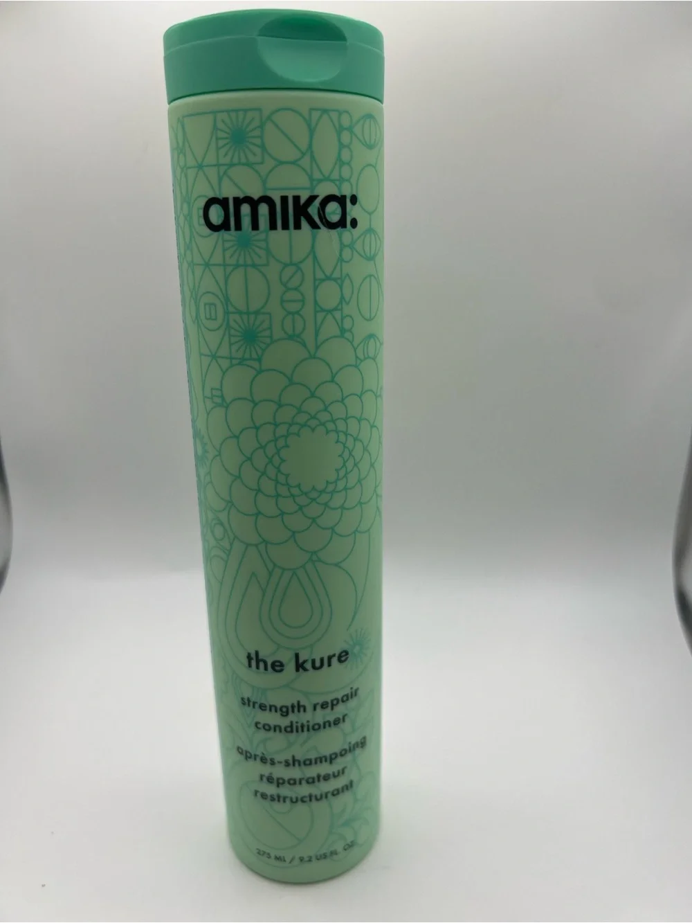 amika Mint Green Strength Repair Conditioner Bottle