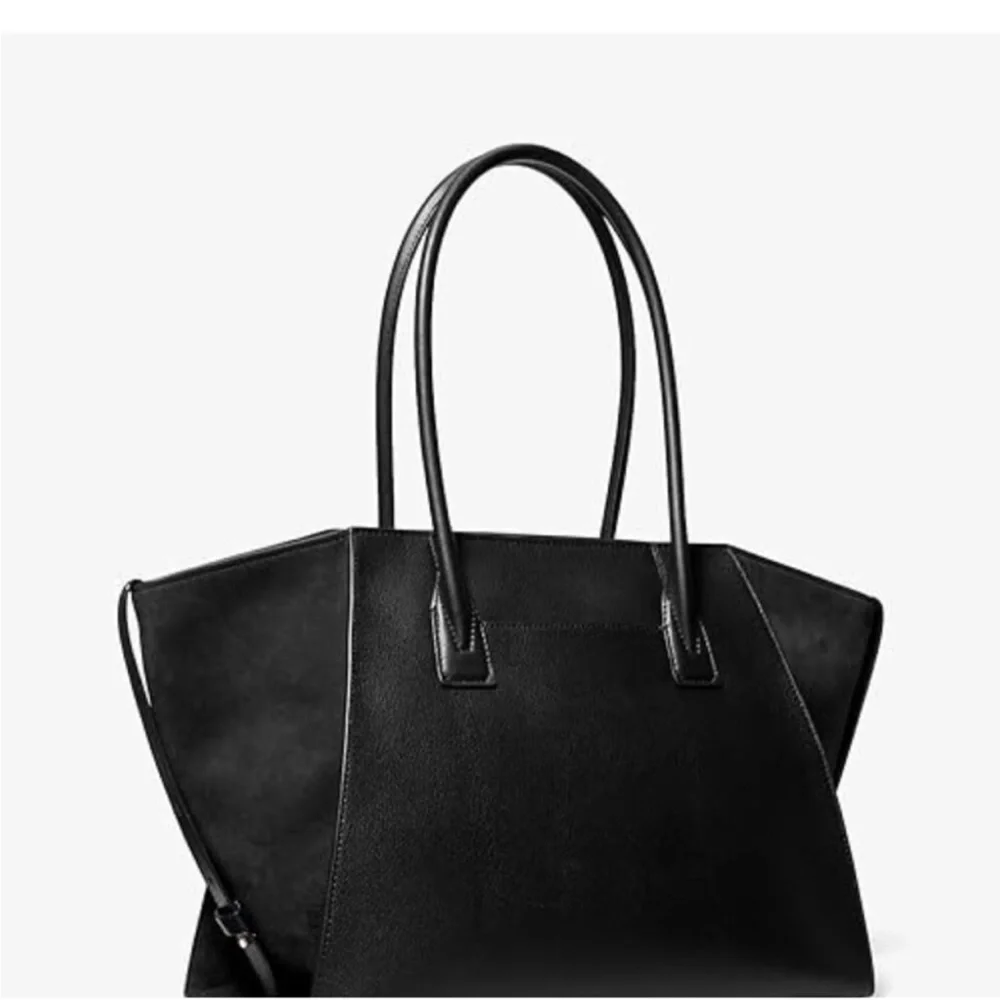 Michael Kors opens strap front