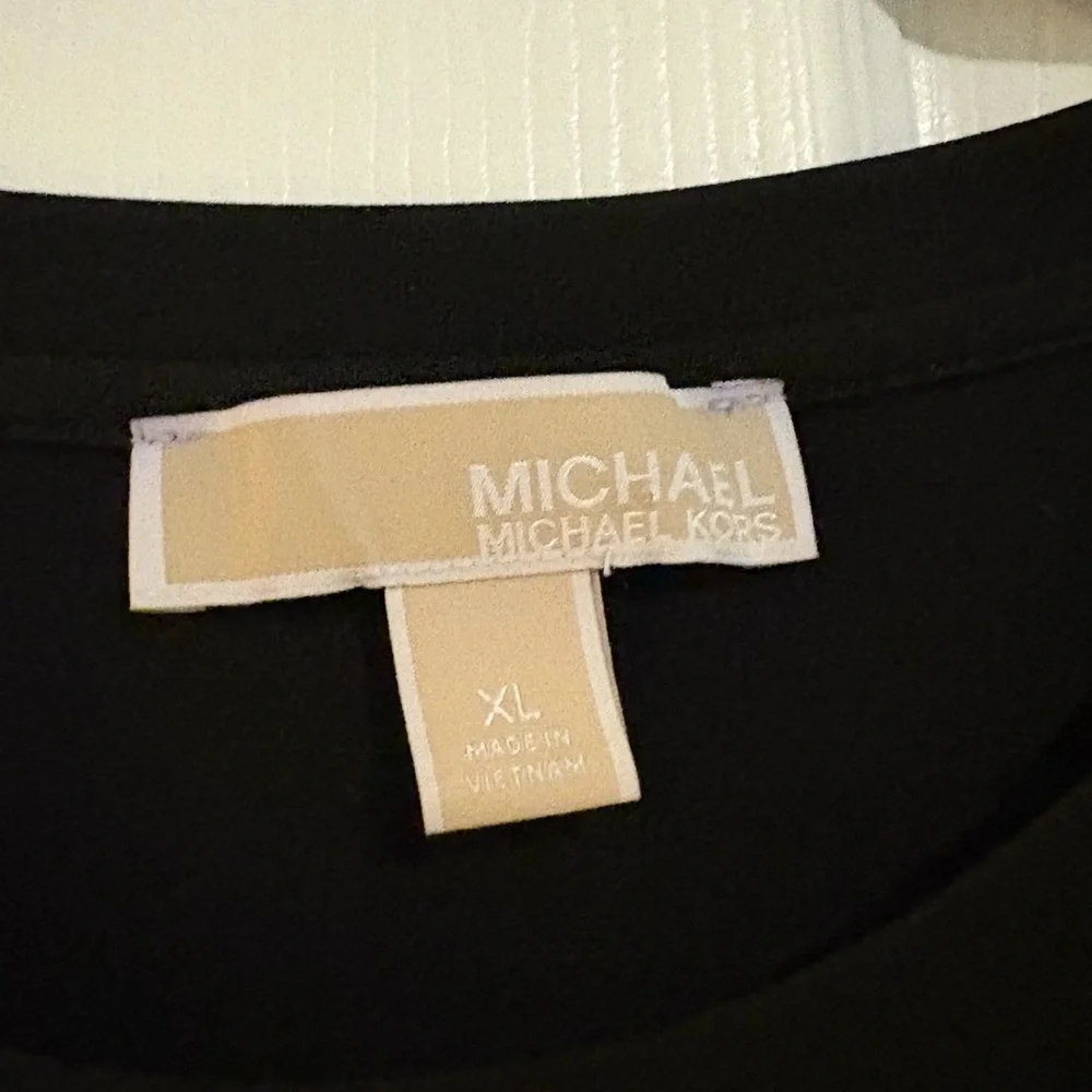 Michael Kors signs worn