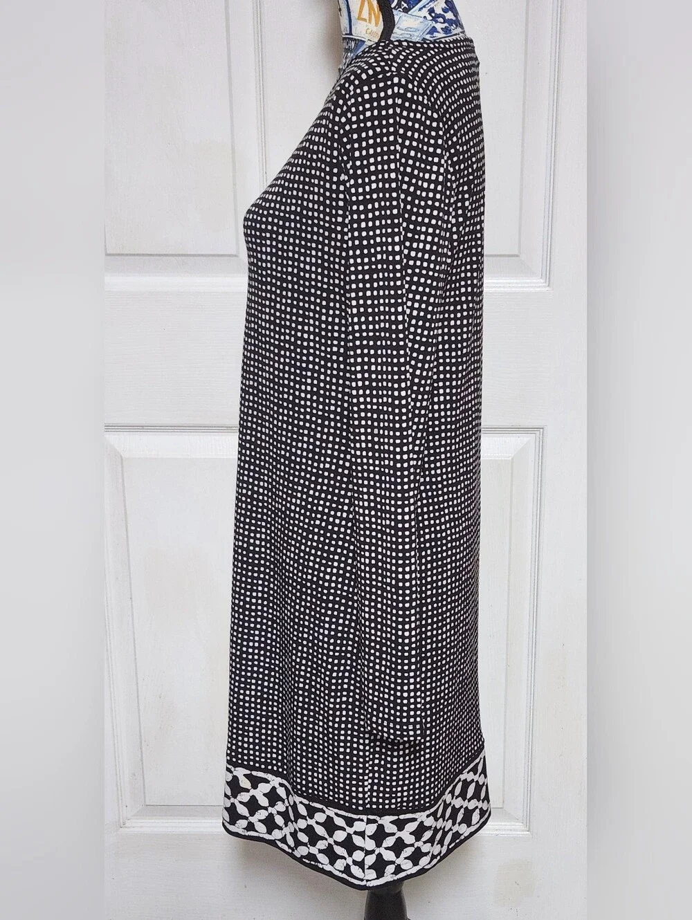 Michael Kors measures laying