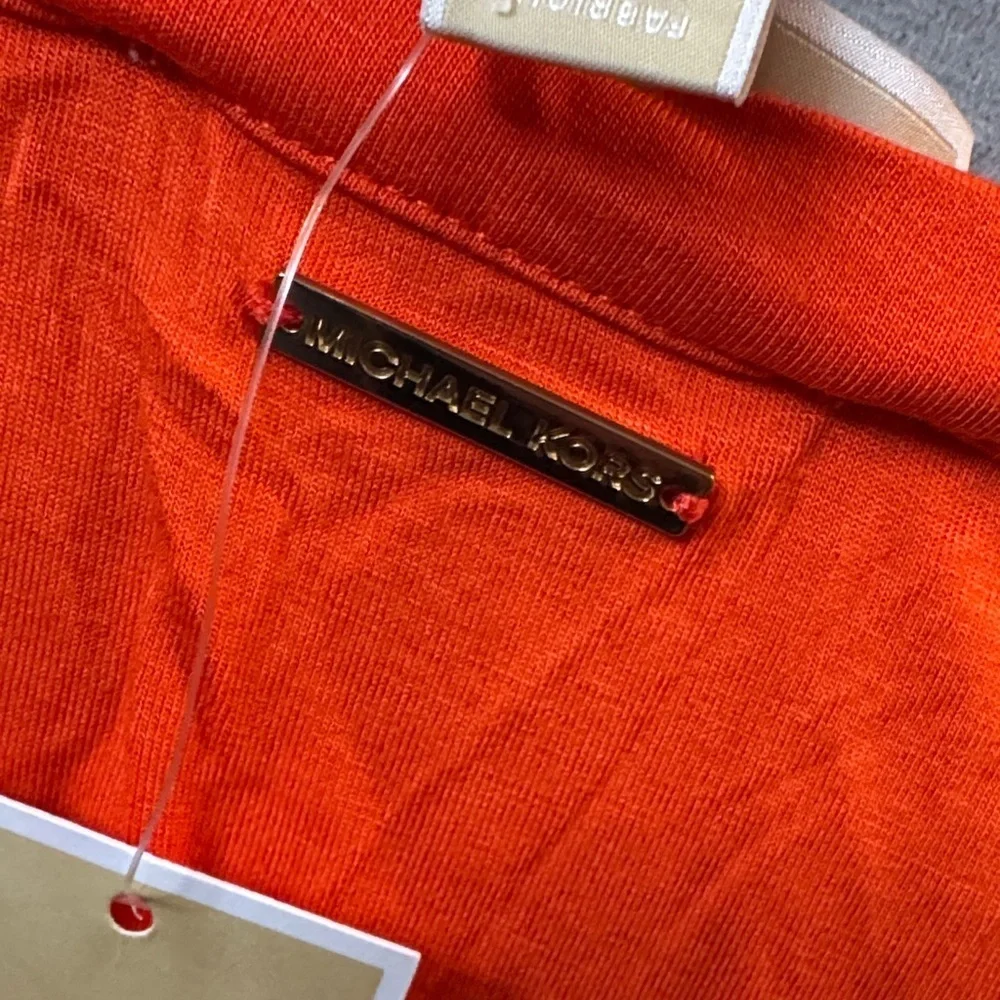 Michael Kors catching great tank