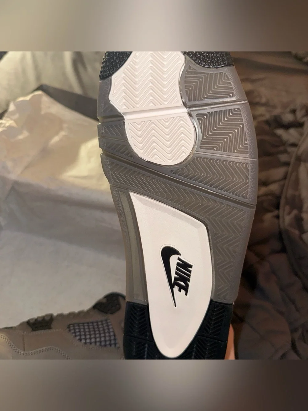 Jordan 4 Retro “Cave Stone”