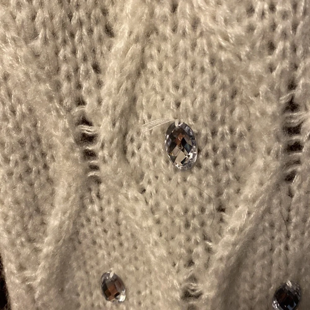 Mixit white winter scarf with embellishment.