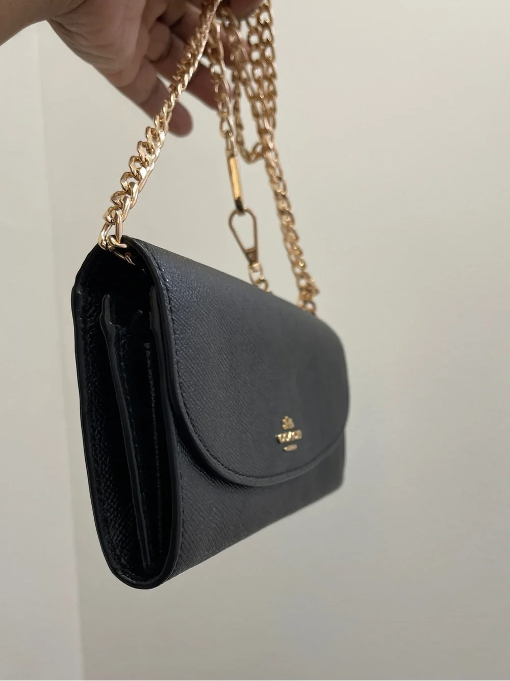 Coach sleek black