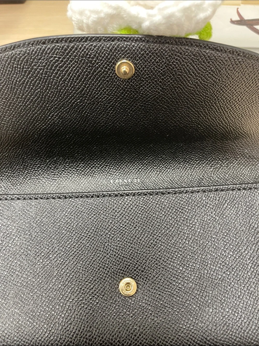 Coach sleek black