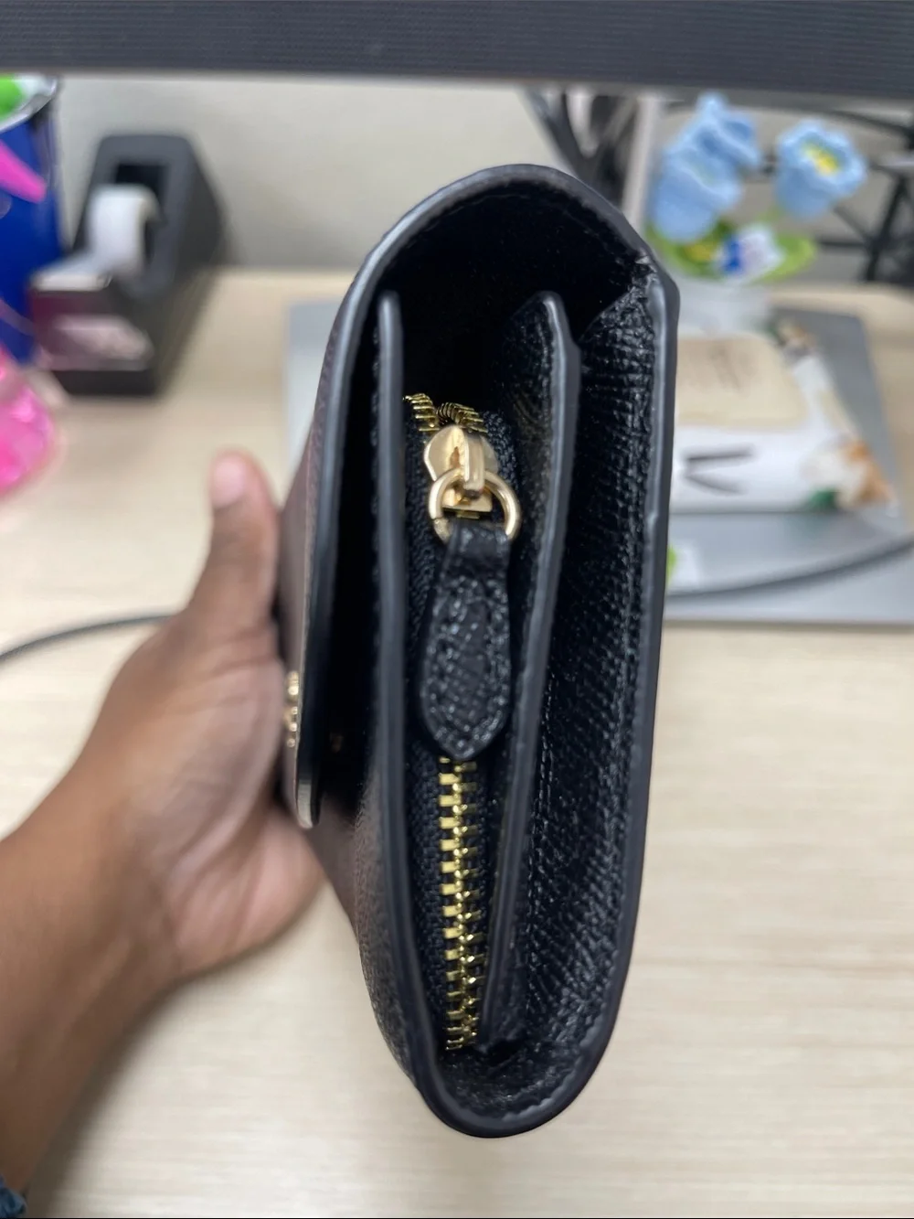 Coach sleek black