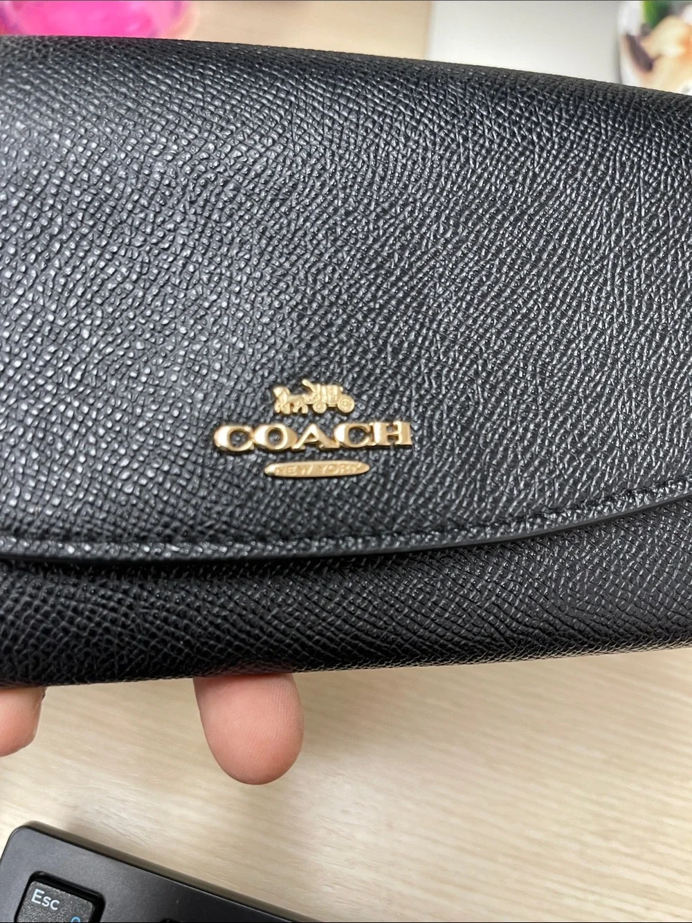 Coach sleek black