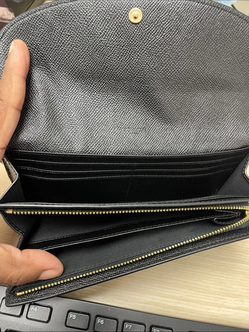 Coach sleek black