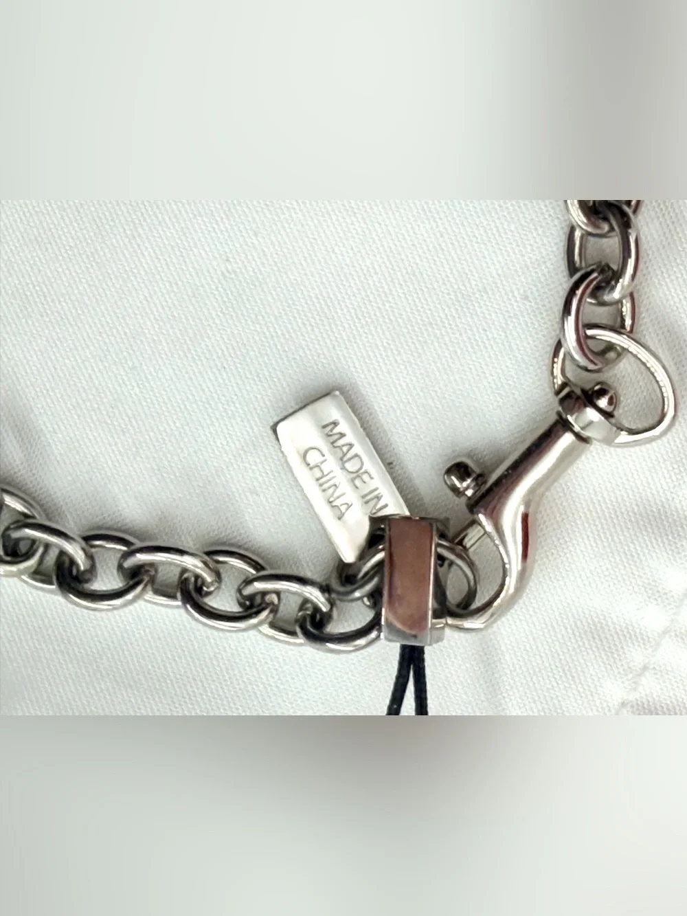 Coach can hangtag