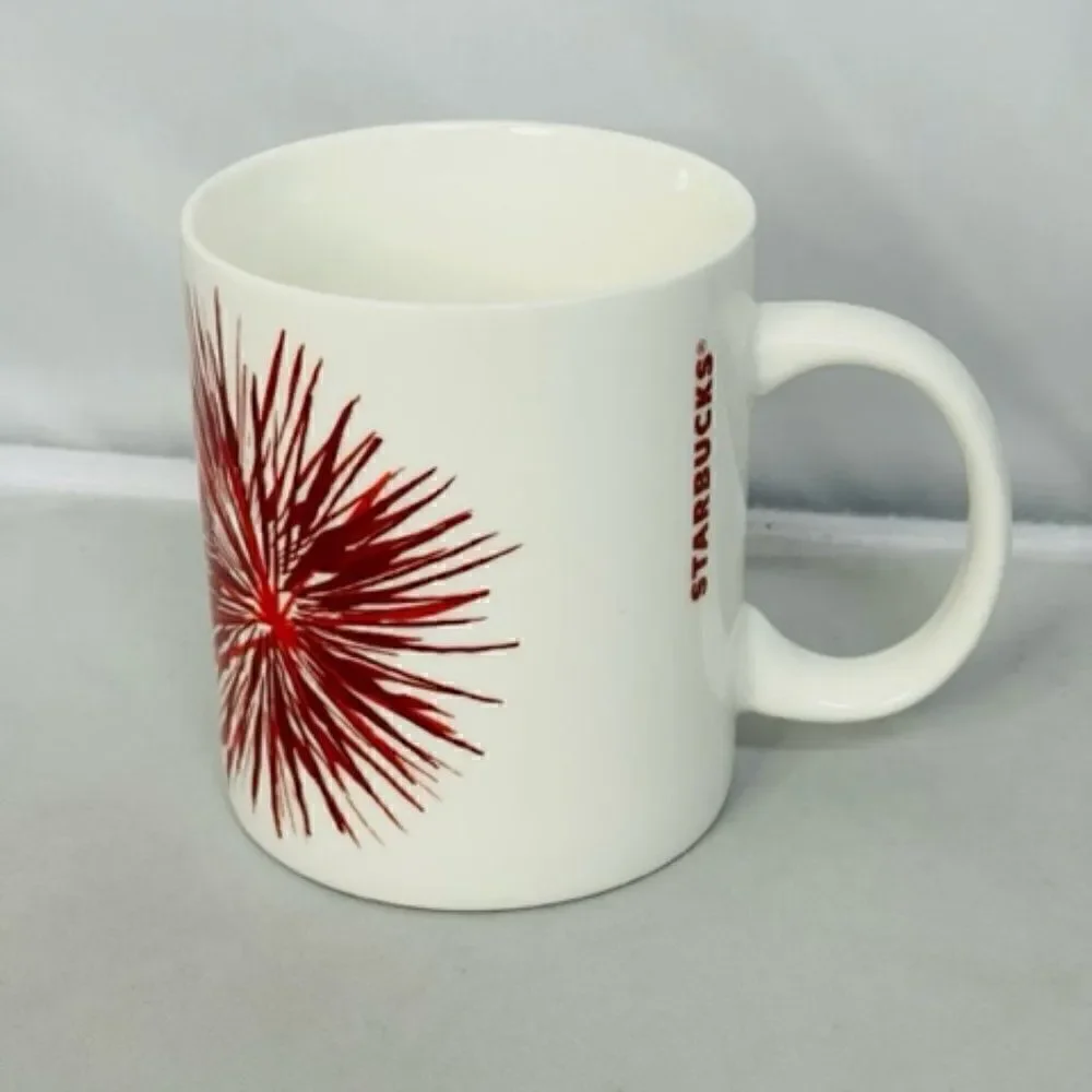 2014 Starbucks Coffee Mug Red Starburst Holiday Cup 12 oz Excellent - No cracks