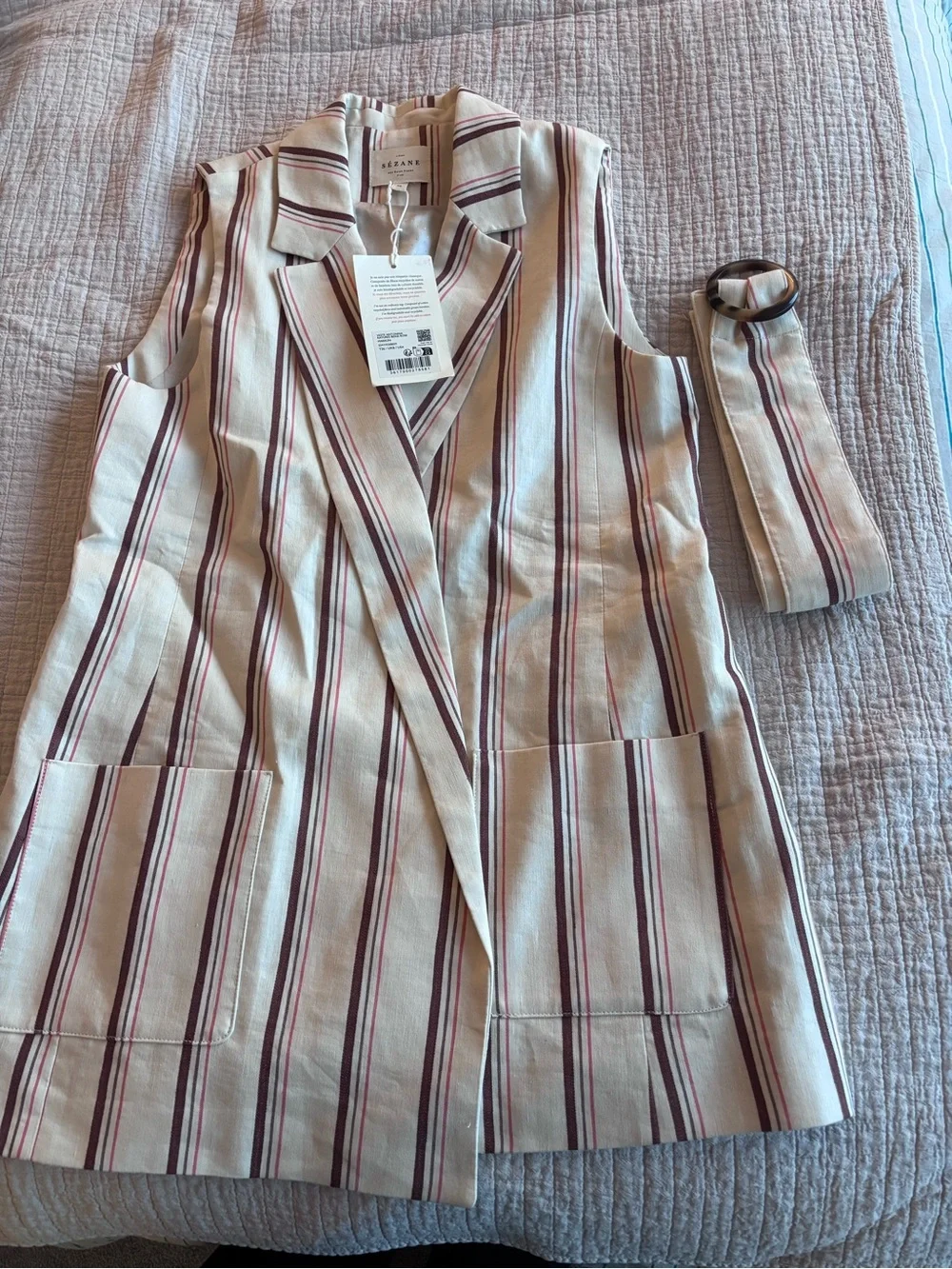 Sezane selling sleeveless pockets