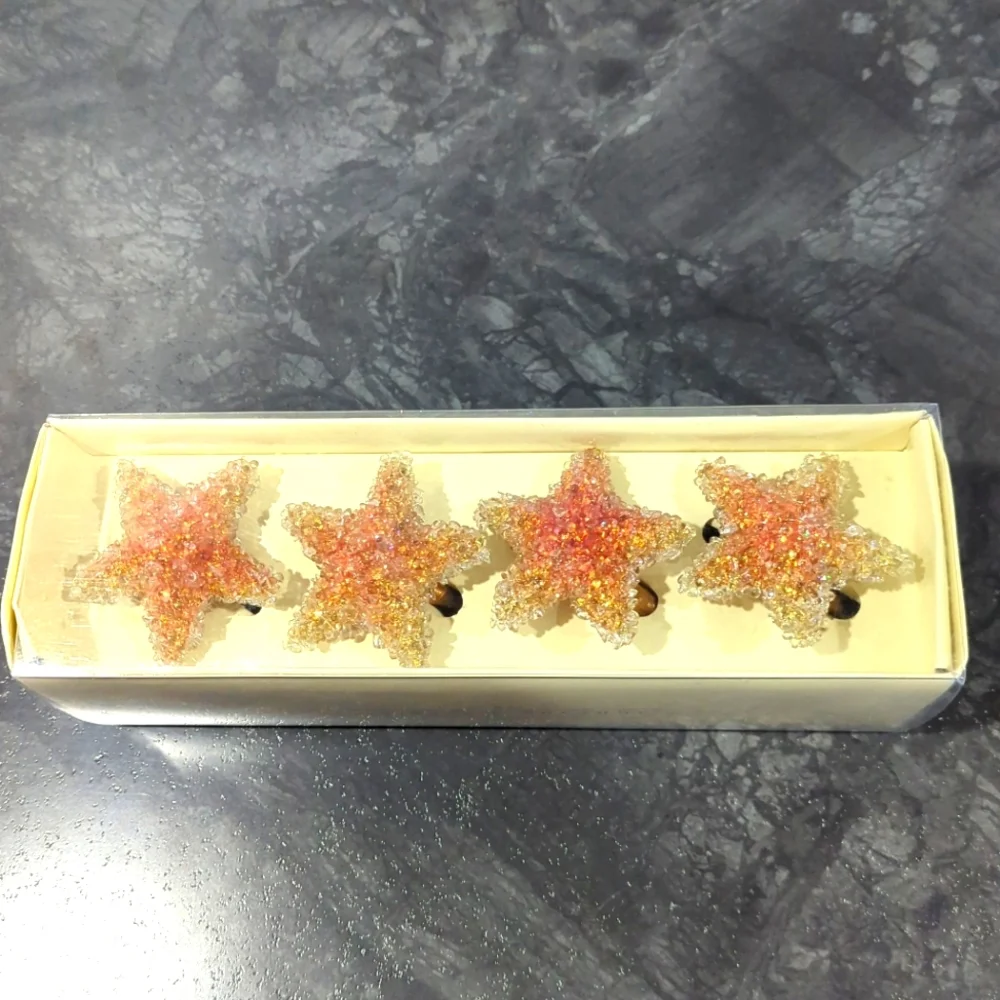 Pier 1 imports 1 Set of 4 Shiny Glittery Starfish Star Shaped Napkin Rings