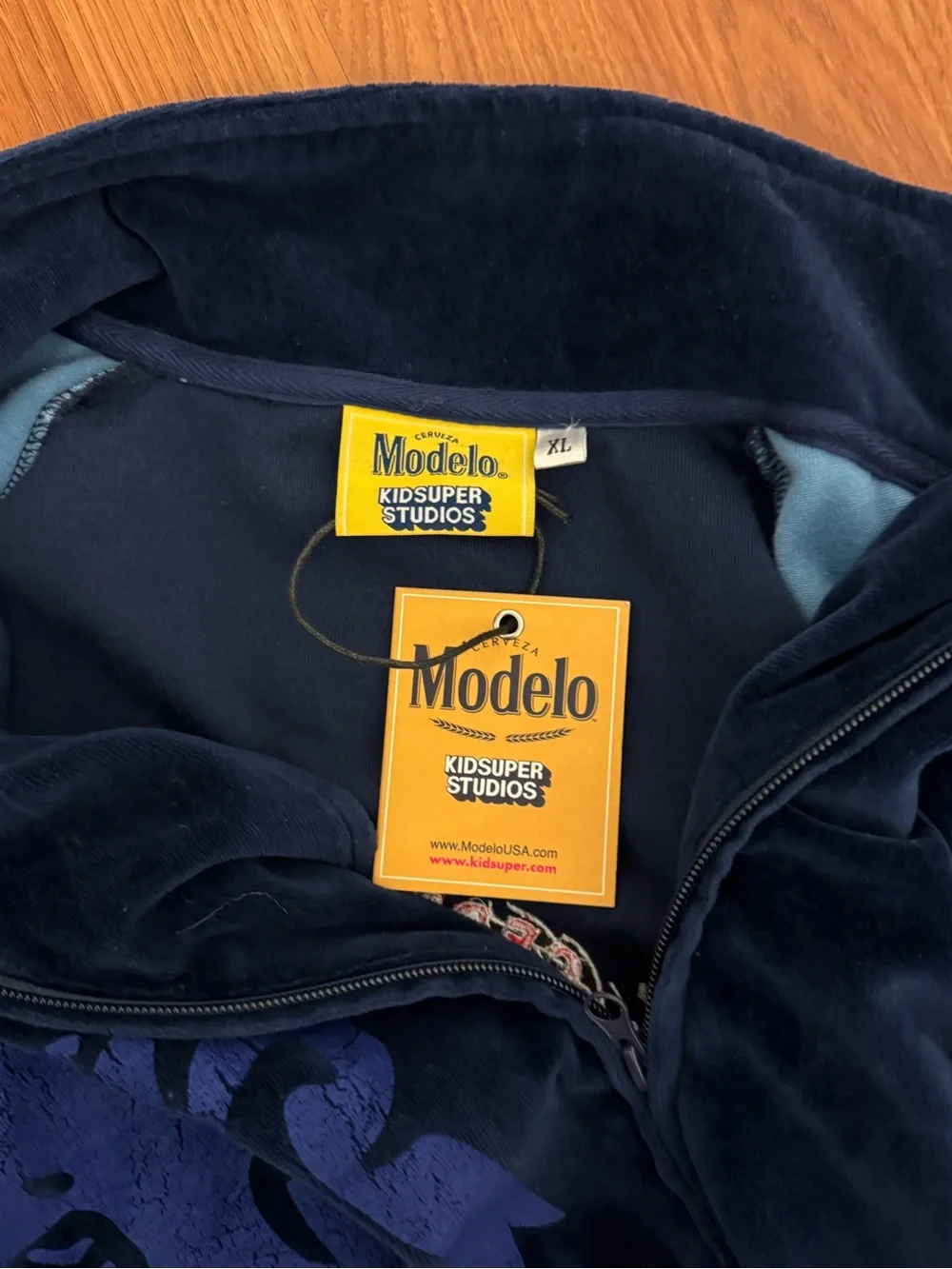 ModelCo tags red