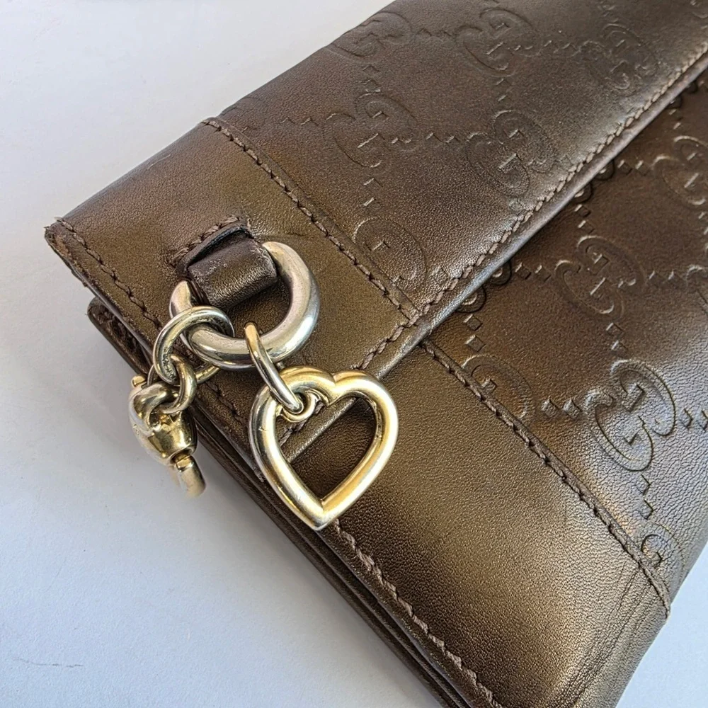 Gucci Embossed Brown Leather Wallet