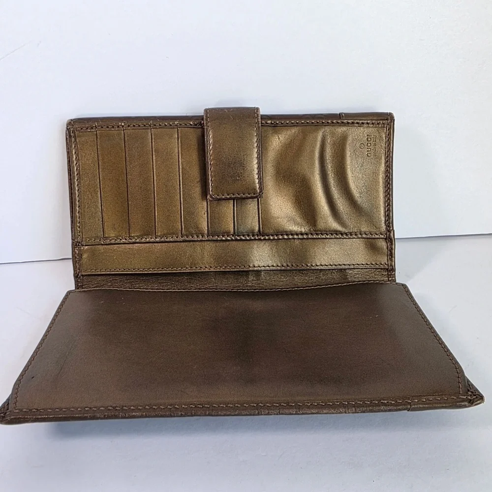 Gucci Embossed Brown Leather Wallet
