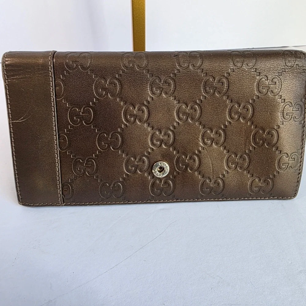 Gucci Embossed Brown Leather Wallet