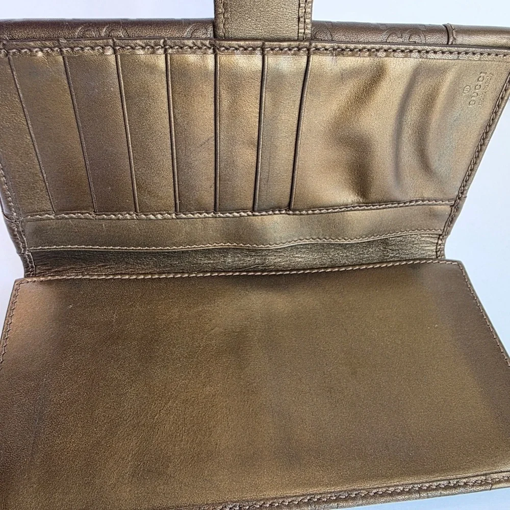 Gucci Embossed Brown Leather Wallet