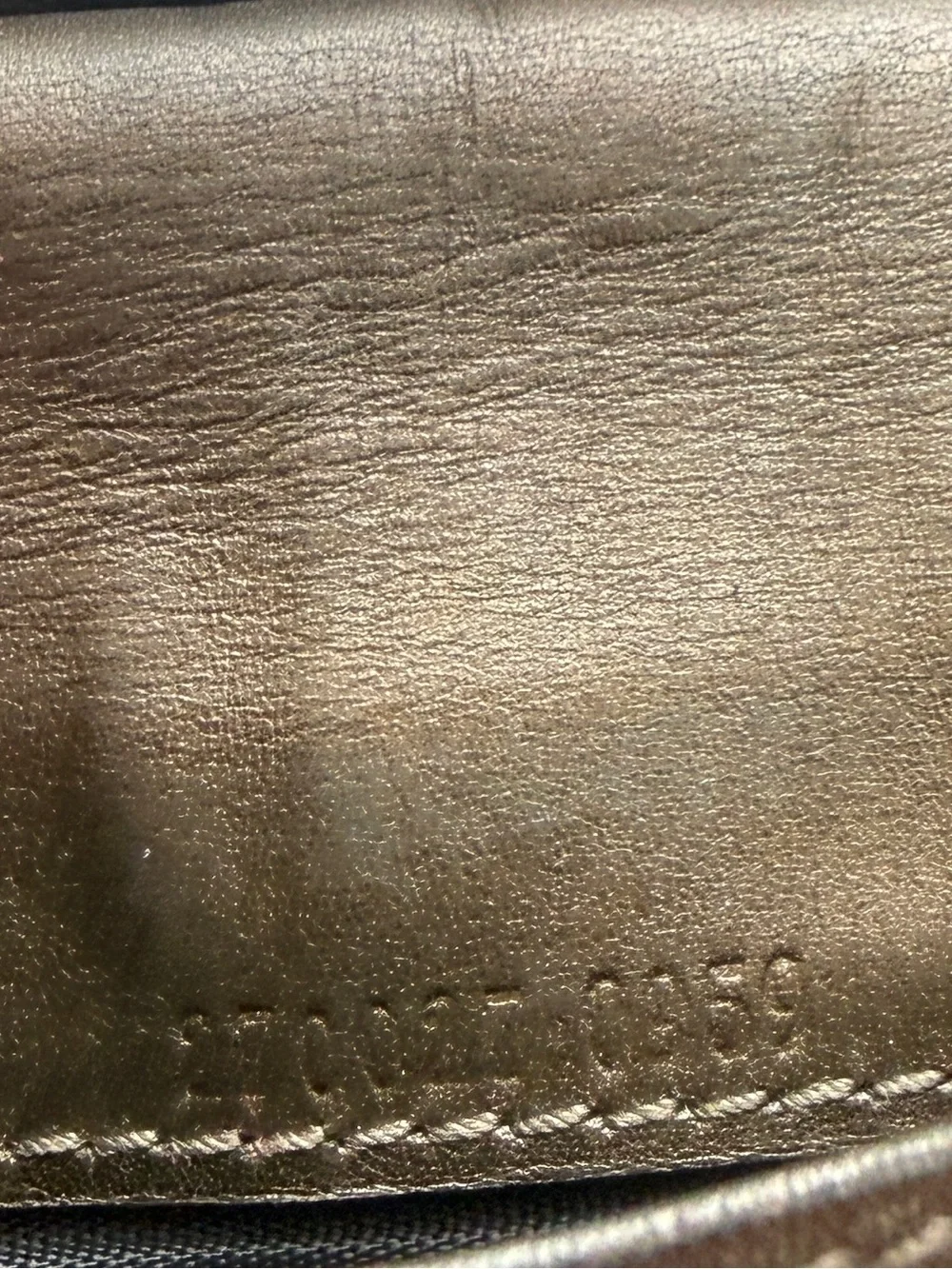 Gucci Embossed Brown Leather Wallet
