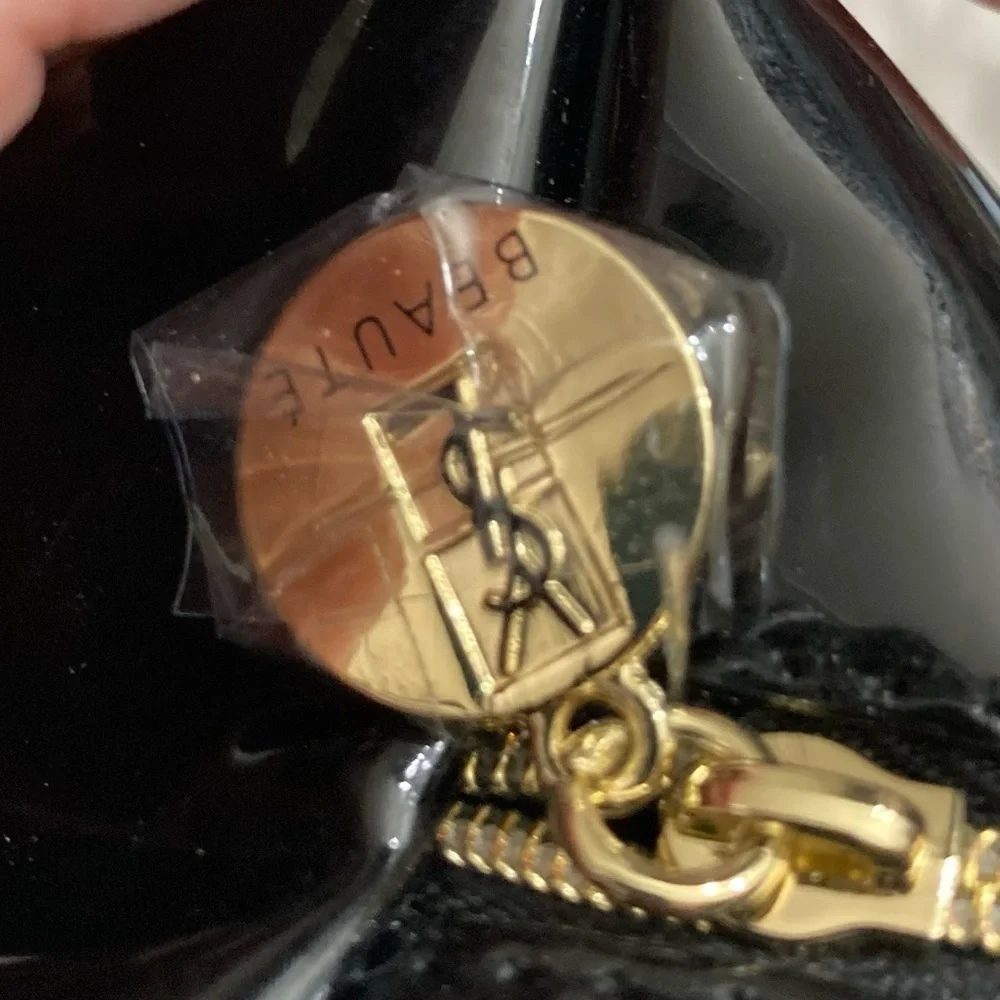 Yves Saint Laurent gently used