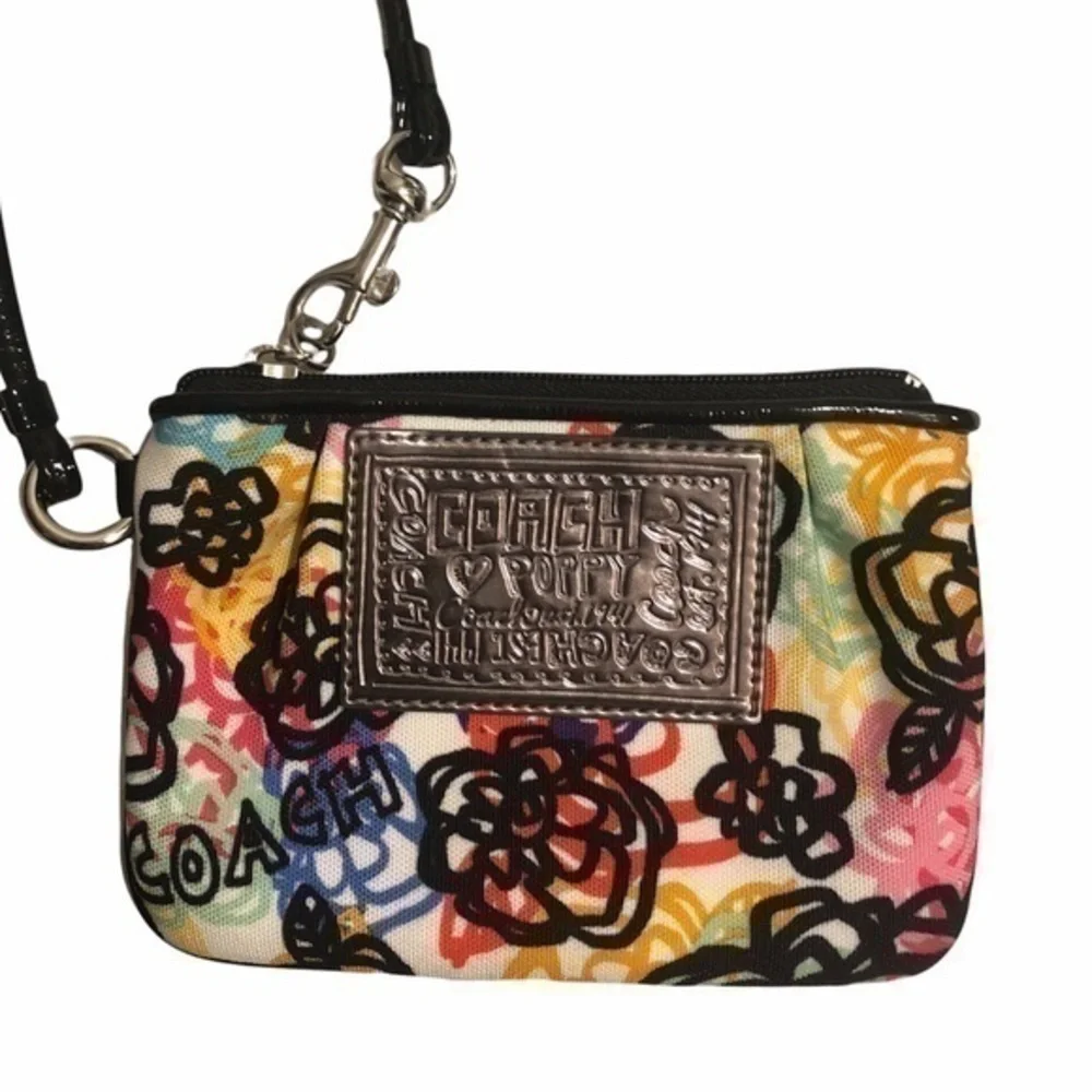 Coach poppy floral wristlet