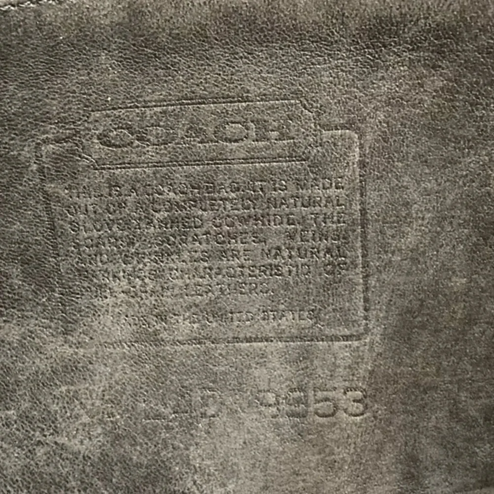 Coach scuffs wear