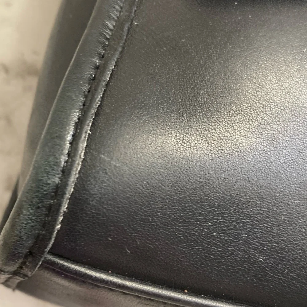 Coach has scuffs