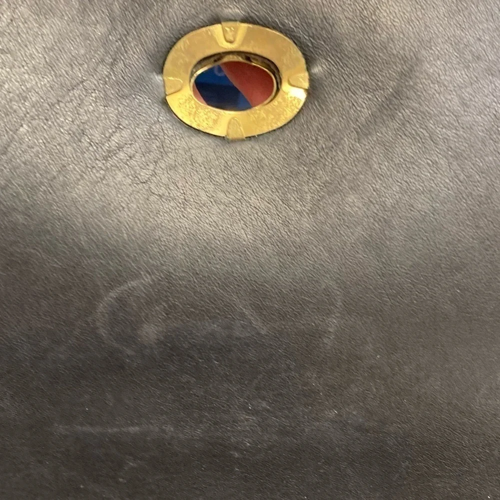 Coach has scuffs