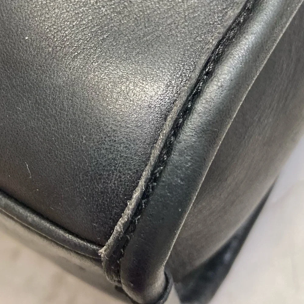 Coach has scuffs