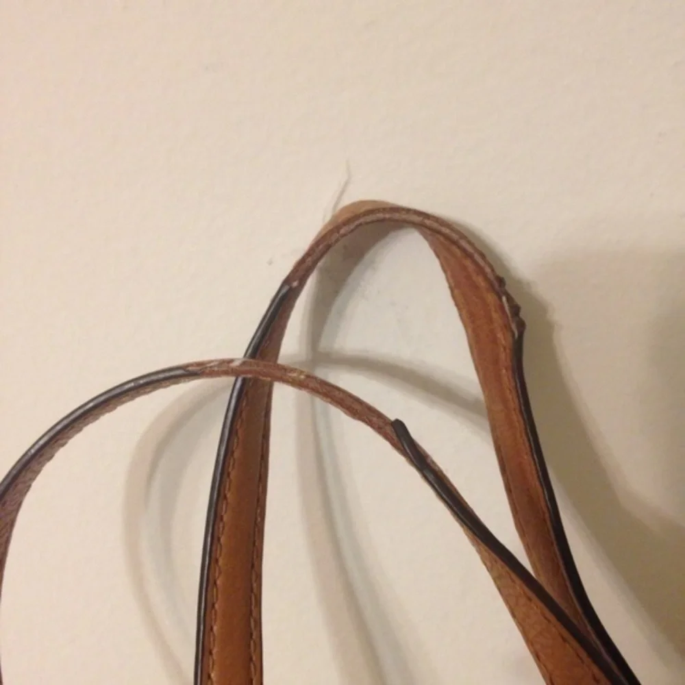 Michael Kors handles bag marks