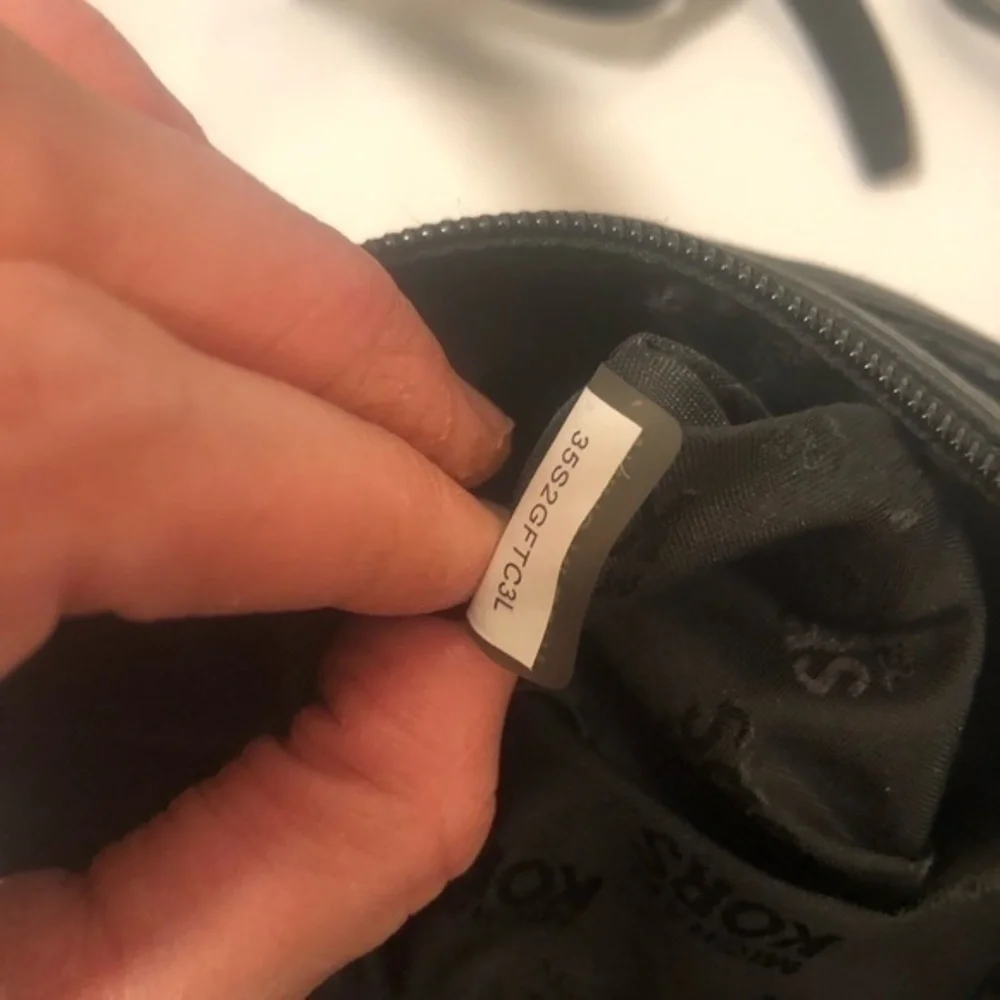 Michael Kors minor logo