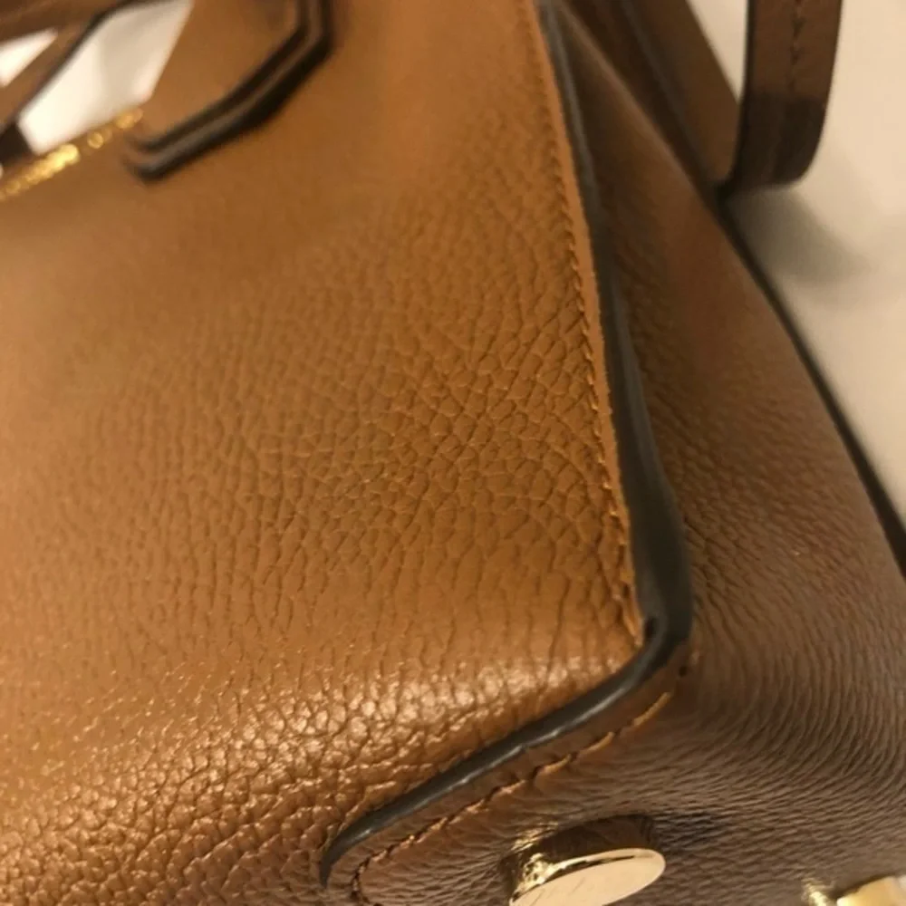 Michael Kors very gently