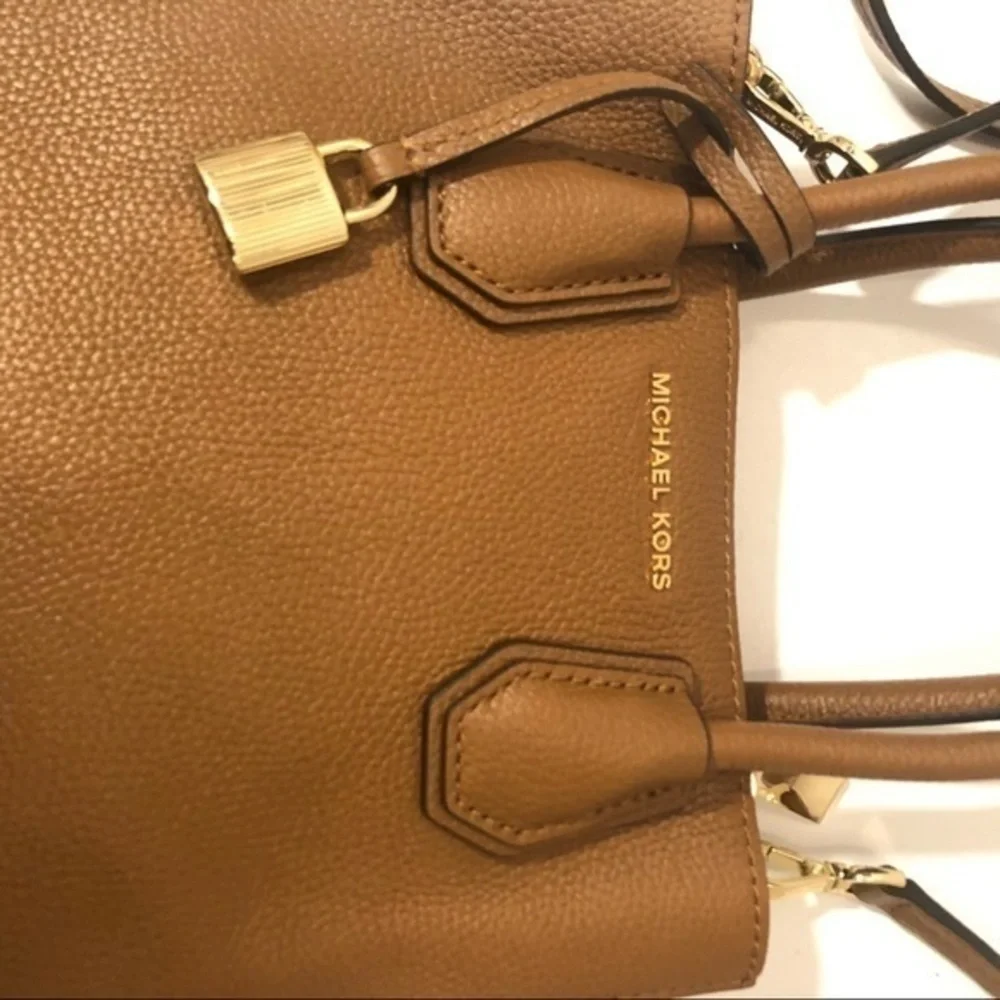Michael Kors very gently